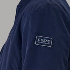 Giacca bomber blu Guess Tech Stretch con patch logo frontale