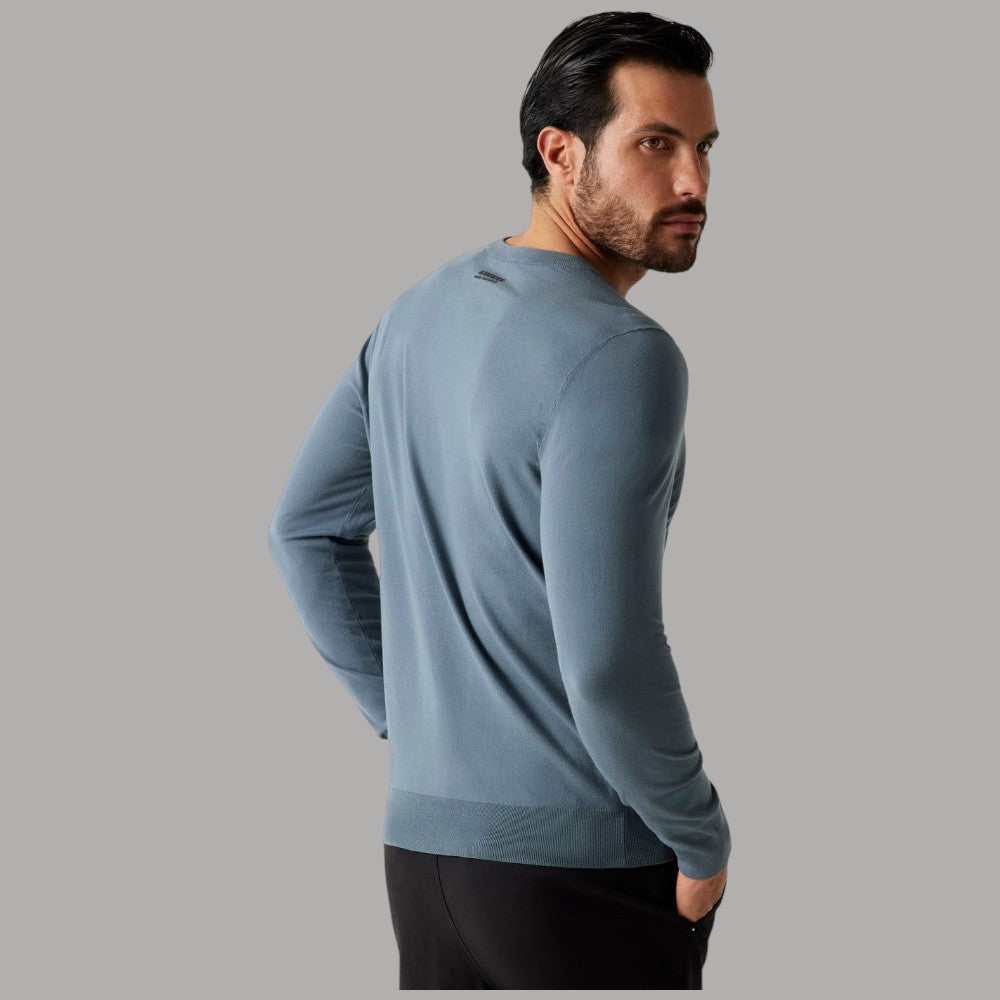 Maglione girocollo azzurro lato con manica lunga e orlo a costine