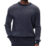 Maglione blu a coste con girocollo e maniche lunghe
