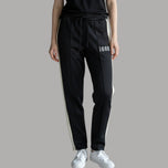 Pantaloni jogger neri con coulisse e fascia laterale, passanti elastici