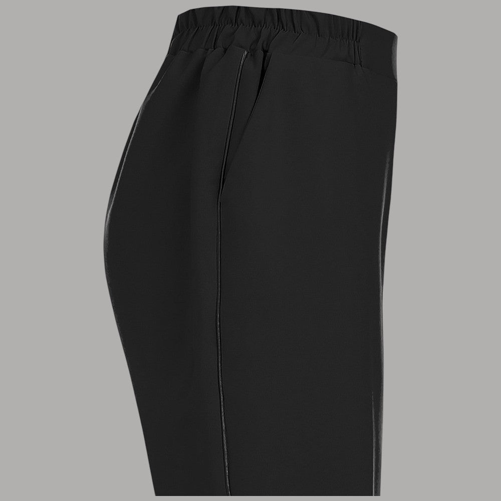 Pantaloni da donna neri con elastico in vita e cucitura frontale