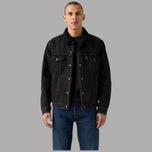 Giacca Levi’s trucker in denim nera con fodera sherpa e chiusura a bottoni