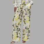 Pantaloni a fiori in raso, coulisse elastica in vita e gamba ampia, motivo foglie.