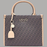 Borsa tote monogram testa di moro con manici in pelle chiara e accessori metallici