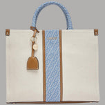 Borsa media crema con inserti jacquard blu e tracolla, charm removibile in pelle