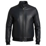 Giacca bomber in ecopelle blu con zip frontale e polsini a costine.