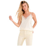 Top crema con scollo a V in pizzo e spalline sottili