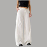 Pantalone jogger Guess bianco a vita alta, coulisse e gamba ampia palazzo