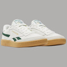 Scarpe da ginnastica Reebok bianche con inserti verdi e suola gum