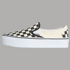 Scarpe Vans slip-on in tela bianca con motivo checkerboard e suola platform