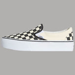 Scarpe Vans slip-on in tela bianca con motivo checkerboard e suola platform