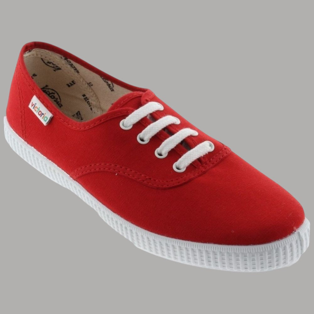Scarpa da donna in tela rossa allacciata con lacci bianchi e suola bianca