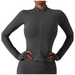 Felpa fitness grigia con zip frontale e maniche lunghe, design aderente