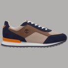 Sneaker Timberland con tomaia tessuto beige e dettagli blu, fondo con accento arancione