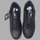 Sneakers uomo nere Refrigue in similpelle e gomma, vista dall’alto con logo