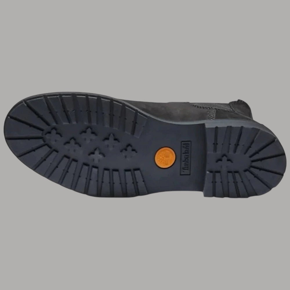 Suola antiscivolo Timberland con battistrada scanalato e logo, colore scuro.