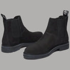 Stivaletti chelsea Timberland neri con pannelli elasticizzati e suola scura.