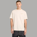 T-shirt Timberland bio, bianca crema, con logo piccolo sul petto