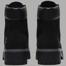 Stivale donna nero in pelle con tallone sagomato e suola plateau tassellata