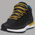 Scarpa Timberland nera con lacci gialli, collar blu, suola bianca e inserti gialli