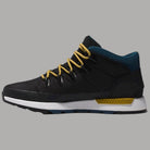 Scarpa Timberland uomo nera con collar blu, lacci gialli, pannelli in texture e suola bianca