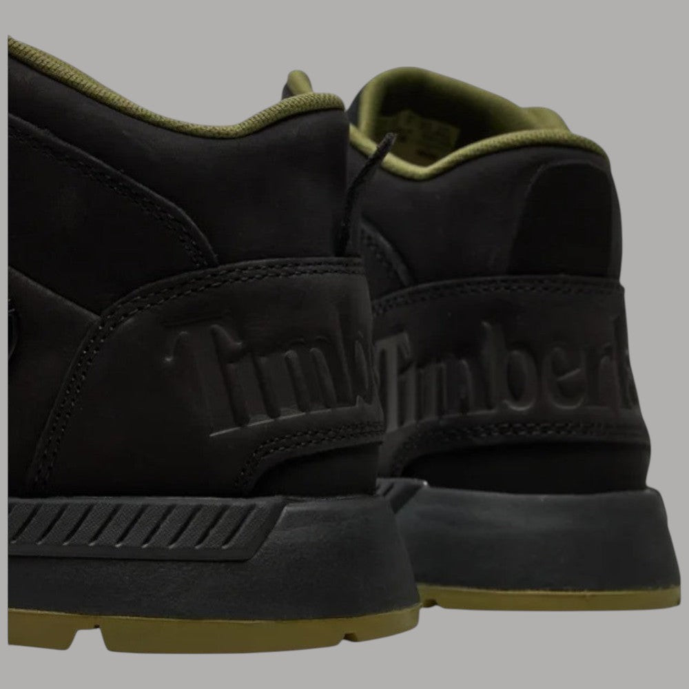 Stivaletto Mid nero: dettaglio logo e pannello laterale, suola gommata