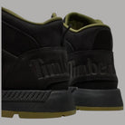 Stivaletto Mid nero: dettaglio logo e pannello laterale, suola gommata