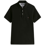 Maglietta polo Tommy Hilfiger nera con bottoni e colletto, logo sul petto
