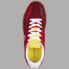 Sneaker Tommy Hilfiger rosse con lacci bianchi, intersuola bianca e plantare giallo