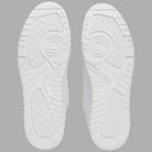 Suola sneaker bianca con rilievi antiscivolo e logo Tommy Hilfiger in rilievo