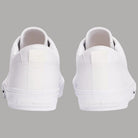 Sneaker bianche in pelle viste posteriori, con tallone e suola vulcanizzata