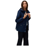 Giacca parka corta blu con cappuccio e chiusura a bottoni, tasche con patta