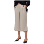 Pantaloni culotte beige chiari con vita alta e gamba ampia, lunghezza al polpaccio