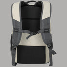 Zaino Travelite melange beige e nero, schienale imbottito con rete e spallacci.