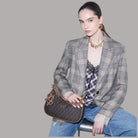 Borsa a spalla Liu Jo in tessuto jacquard con dettagli in pelle e catena dorata