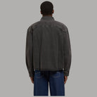 Camicia oversize Dickies in denim nero, vista posteriore con cuciture e colletto.