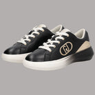Scarpe da ginnastica nere con insert beige e logo metallico, suola platform