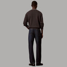Calvin Klein Jeans da uomo Taper 90s blu scuro con texture classica e cuciture visibili, vista posteriore