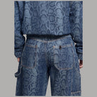 Jeans Liu Jo blu con stampa pitonata, tasche posteriori applicate e tasca cargo