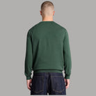 Maglione Timberland verde, vista posteriore con polsini e orlo a coste