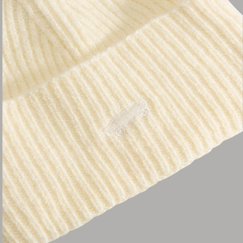 Berretto Vans beige a coste, dettaglio tessuto e logo sul risvolto