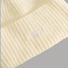 Berretto Vans beige a coste, dettaglio tessuto e logo sul risvolto