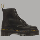 Stivali platform in nappa lavorata Dr Martens Sinclair nero con dettaglio giallo sulla suola