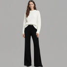 Pantaloni in maglia Liu Jo TF6190MS63L nero con texture liscia e gamba ampia, vista frontale