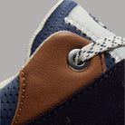 Sneakers uomo Timberland Voyager Park Low Lace blu scuro con dettagli in pelle marrone e tessuto perforato