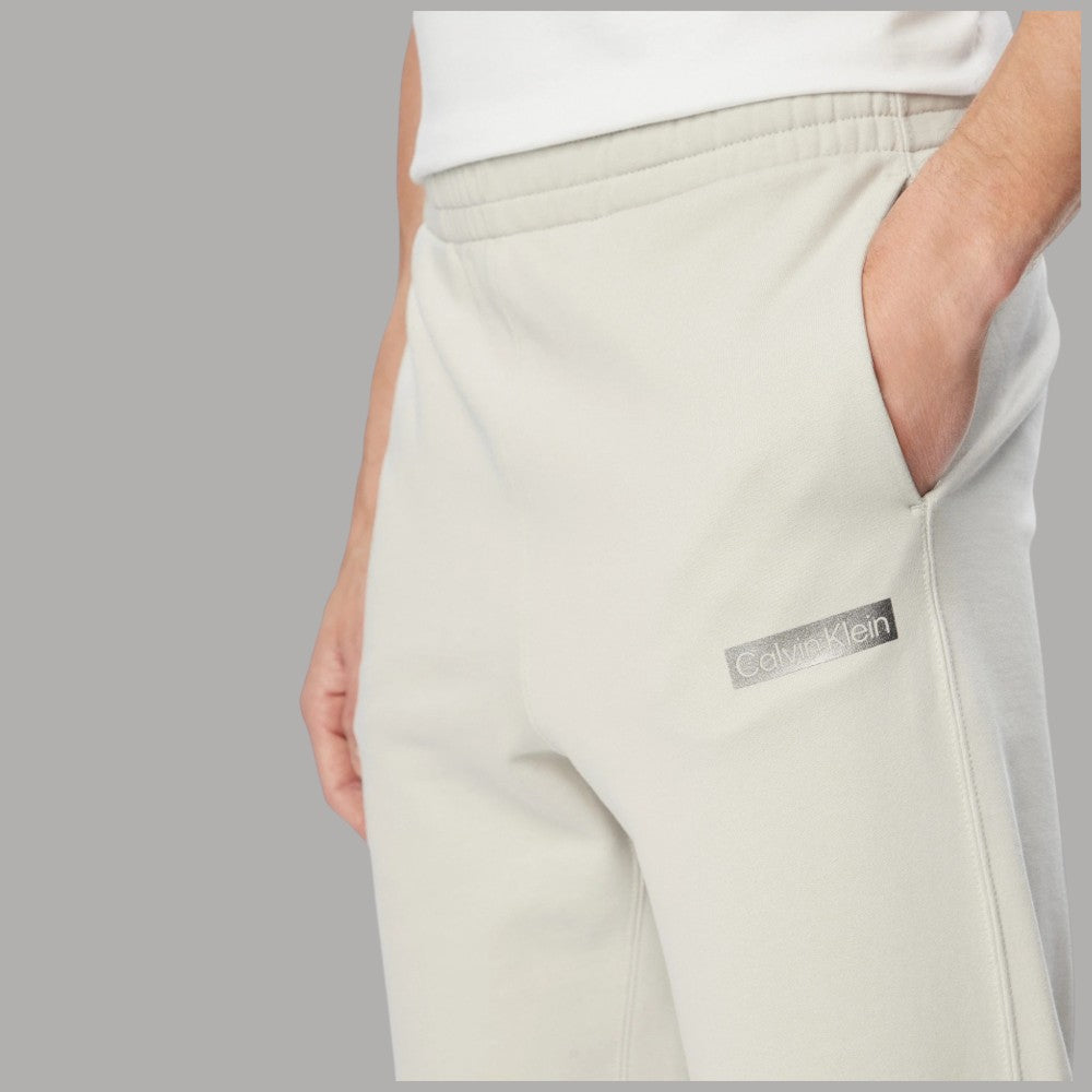 Calvin Klein pantaloni tuta con logo grafico LV04LG212G color crema tessuto morbido dettagli laterali