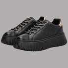 Sneaker platform nere con lacci e maxi logo con bordi dorati