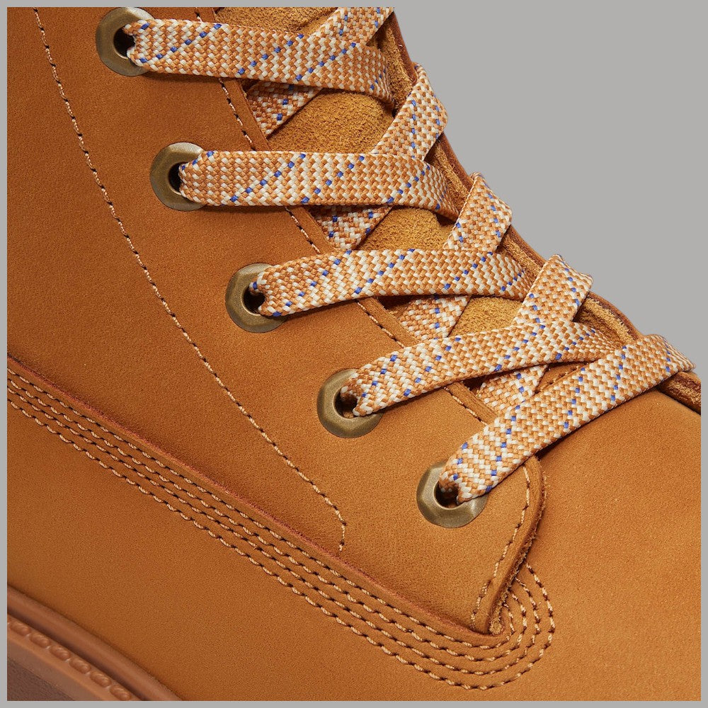 Stivale Timberland con plateau in giallo, dettaglio lacci e occhielli