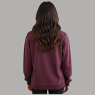 Felpa girocollo in scuba color bordeaux con logo strass Liu Jo TF6206J3958, dettaglio logo strass