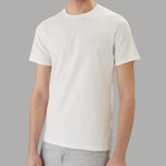 T-shirt bianca con logo piccolo sul petto, girocollo a maniche corte